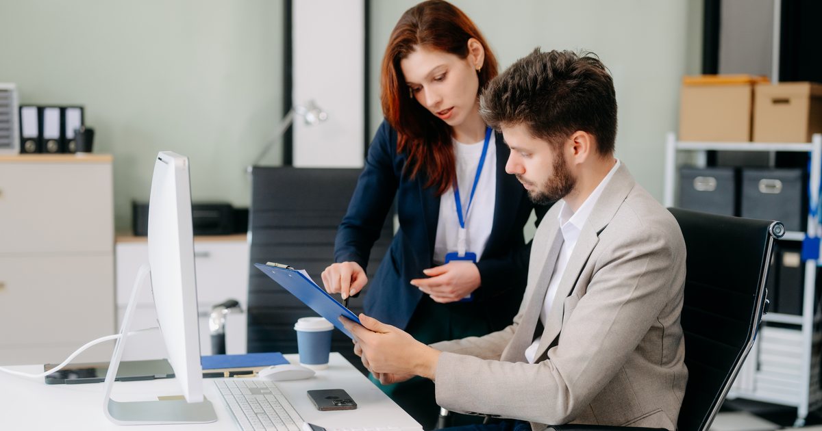 ISO/IEC 27001 Lead Auditor and Lead Implementer reviewing documents